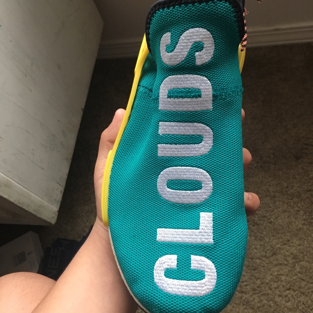 Pharrell Williams human race sun glow trail